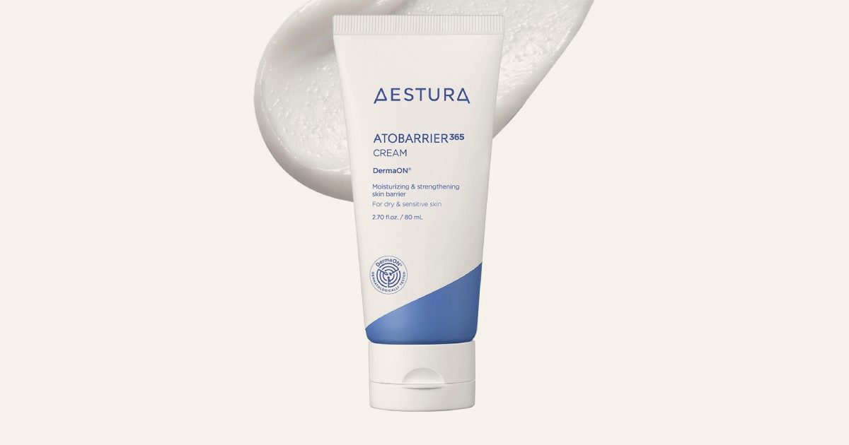 Official AESTURA Atobarrier 365 Cream texture key visual with the identifiable tube in front of a swatch of white cream